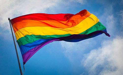 Rainbow flag waving in wind