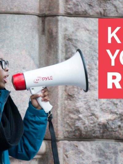 Female student with bullhorn and Know Your Rights text