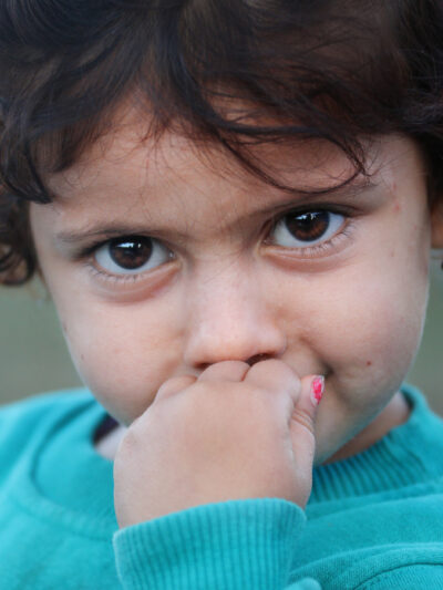 Small child looking directly at camera