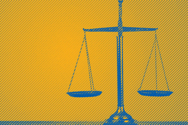 Blue scales of justice on yellow background