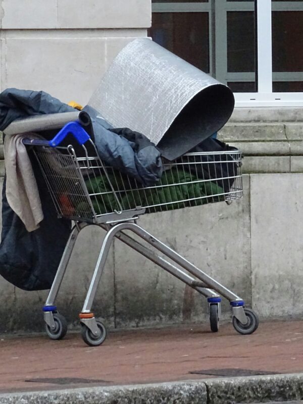 Shopping cart filled with the belongings of a homeless individual