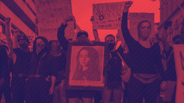 People holding protest signs and raised fists with blue and red duotone treatment