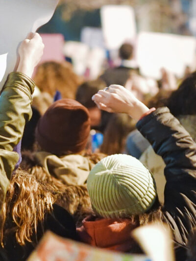 A backward view of protesters.