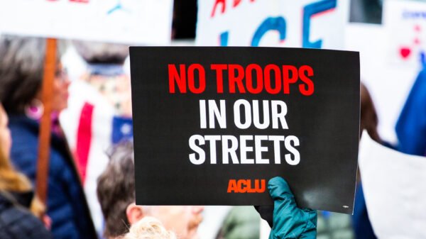 No Troops in Our Street poster at a protest in Portland, Maine.