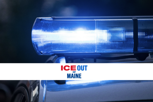 Police light with text "ICE Out of Maine" over it.