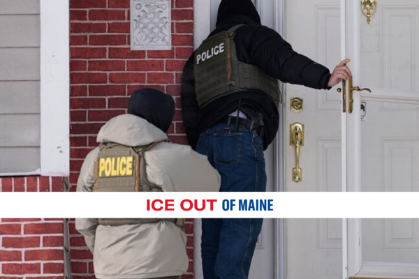 Police at the front door of a home.