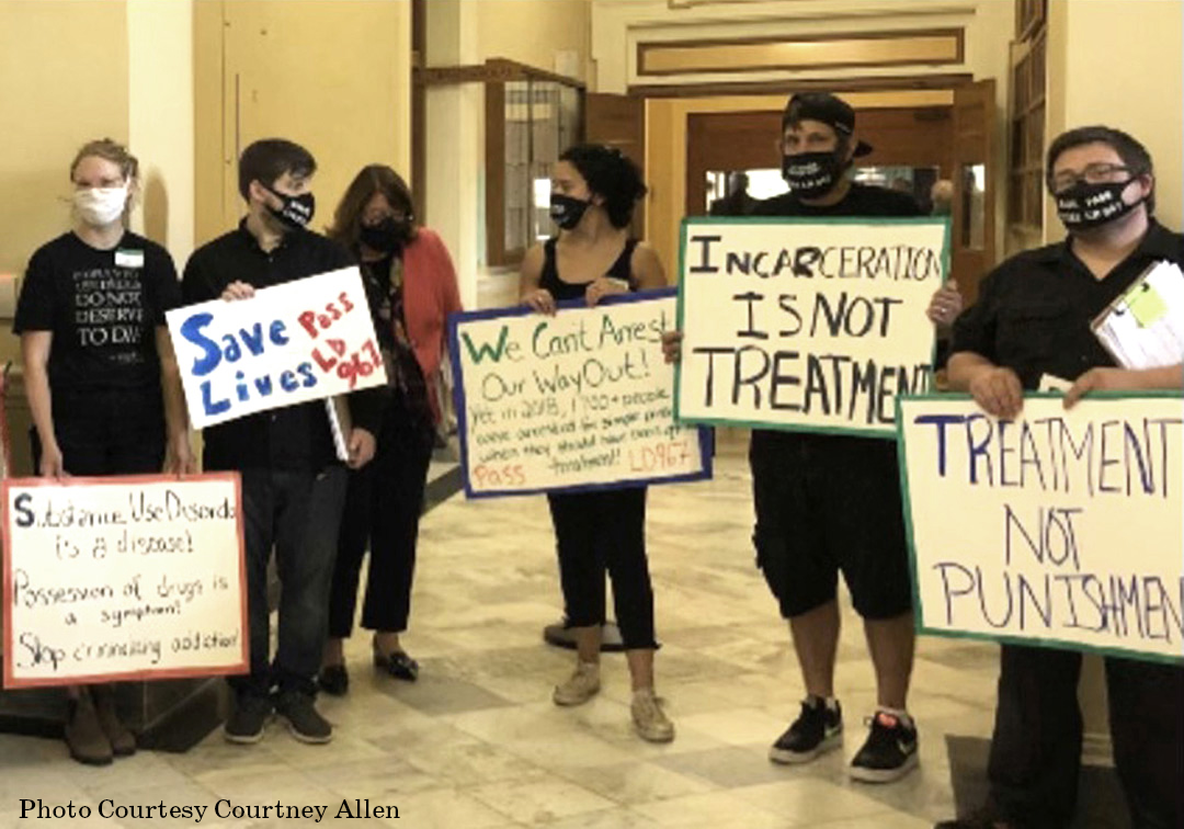 Advocates for LD 967 at an event at the Maine State House