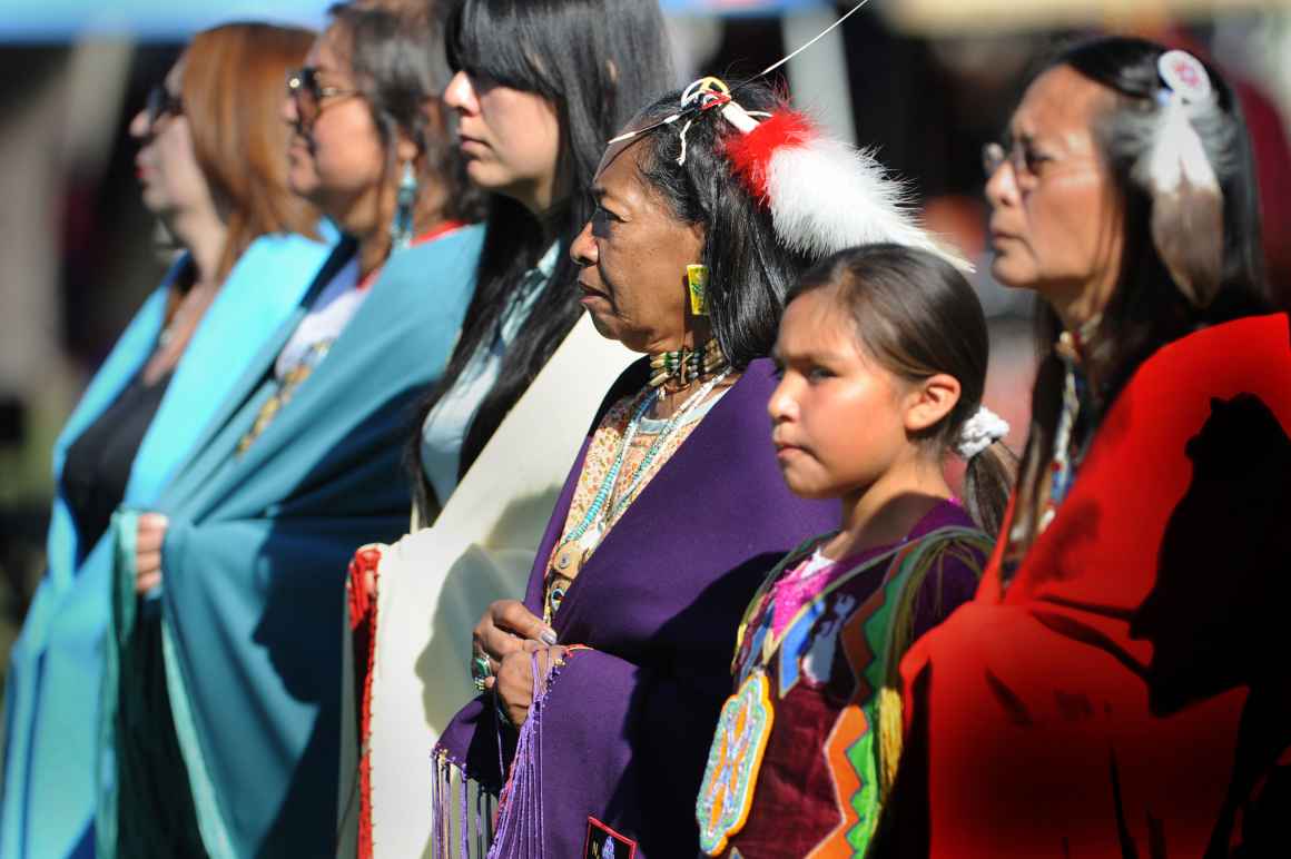 Beth Henderson, (center), Wabanaki-Micmac tribe member, from New Bedford, Massachusetts