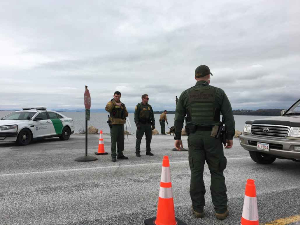 Customs and Border Patrol Agents stopping a vehicle for inspection in Vermont.