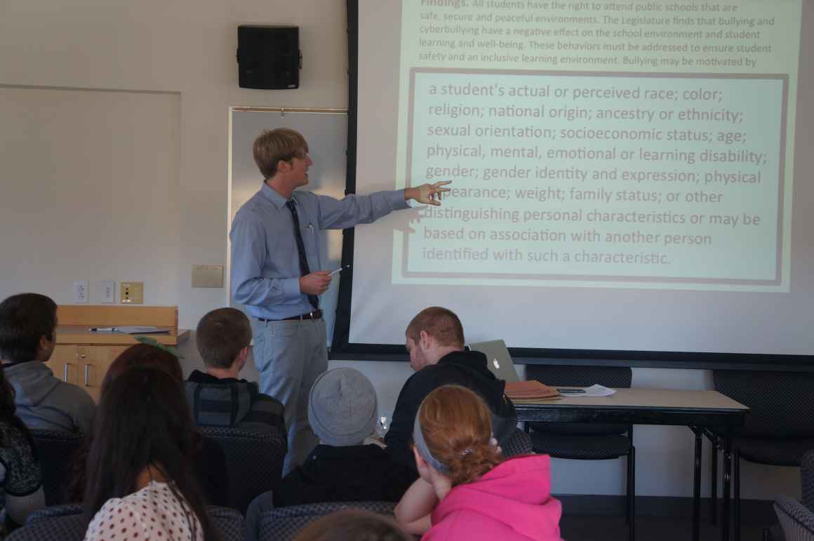 ACLU representative instructs high school student on Maine anti-bullying law