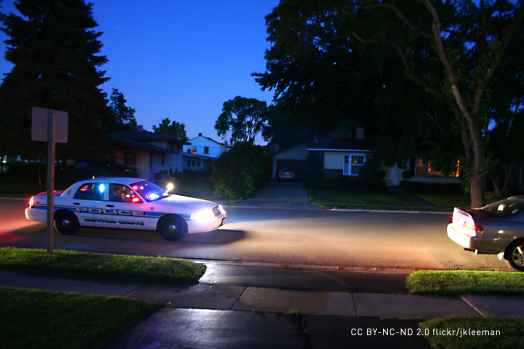 Traffic stop with police car and flashing lights